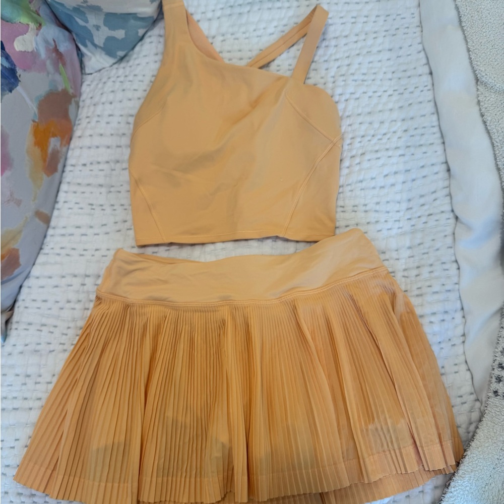 Orange Lululemon Set: Pleated Skirt and Asymmetrical Top